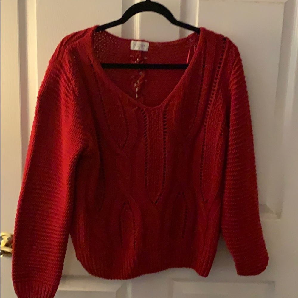 Red sweater with lace up back feature